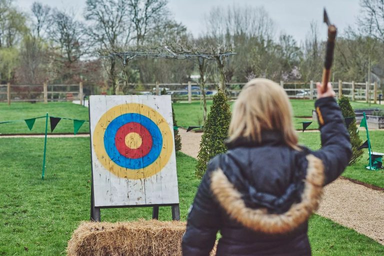 Axe throwing at corporate event day at The Retreat in Silchester in Hampshire
