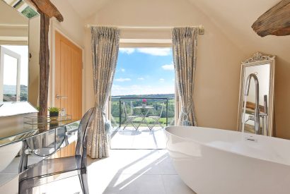 The bath tub with countryside view at Horseshoe House, Peak District