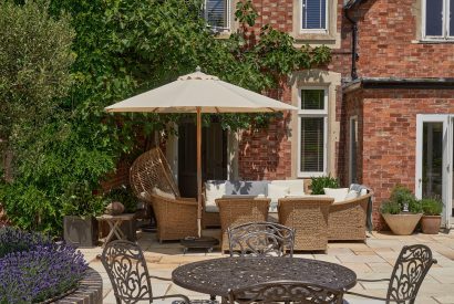 An outdoor dining area at The Coach House, Cotswolds