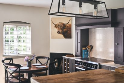 The open plan kitchen and dining area at The Coach House, Cotswolds