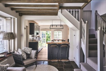 The open plan kitchen and living room at The Coach House, Cotswolds