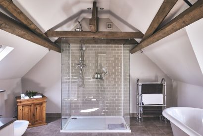 The bathroom with walk in shower at The Coach House, Cotswolds