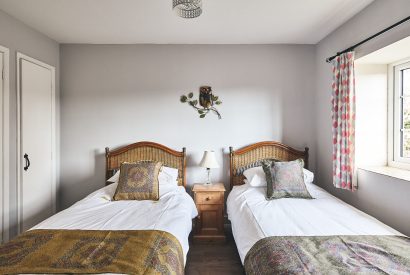 A twin bedroom at Blackdown Cottage, Devon