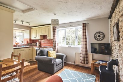 The open plan kitchen and living room at Harcombe Cottage, Devon
