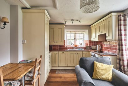 The open plan kitchen and dining area at Harcombe Cottage, Devon