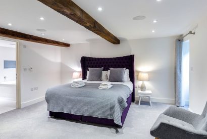 The bedroom with beams at Honister Cottage, Lake District