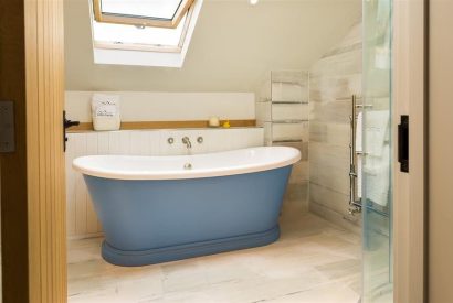 A roll top bath tub at Thresher's Cottage, Lake District