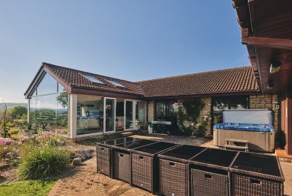 The exterior and hot tub at Shepherd's Lakeview, Somerset