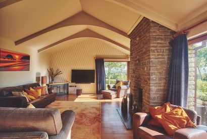 The living room with fire place at Shepherd's Lakeview, Somerset