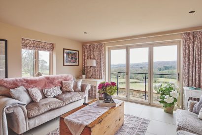 The living room with views at Horseshoe House, Peak District
