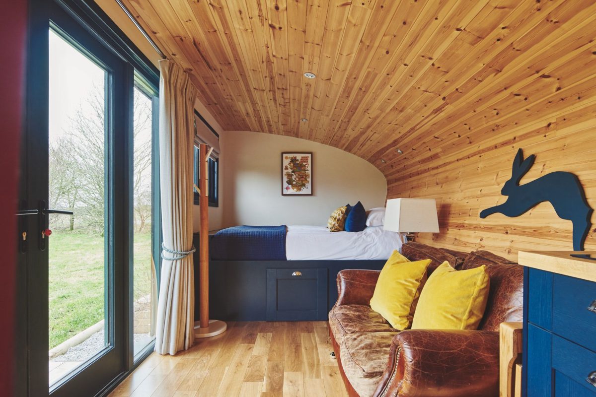 The living area and bedroom at Padley Cabin, Peak District