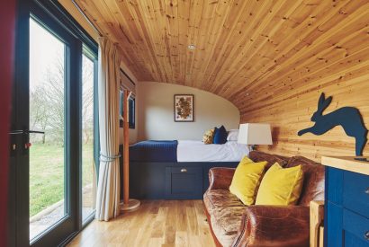 The living area and bedroom at Padley Cabin, Peak District