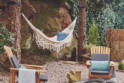 The outdoor seating area and hammock at Hidden Orchard, Cheshire