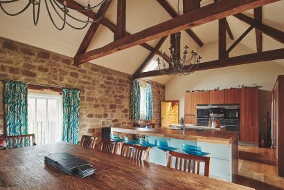 The kitchen and dining area at Woodpecker Loft, Peak District