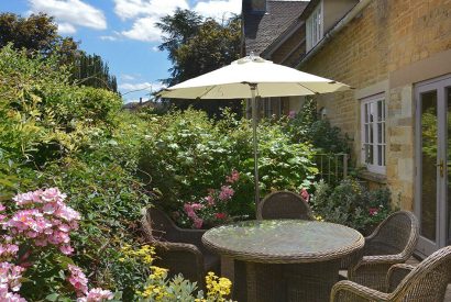 An outdoor dining area at Wordsworth Cottage, Cotswolds