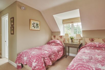 A twin bedroom at Wordsworth Cottage, Cotswolds