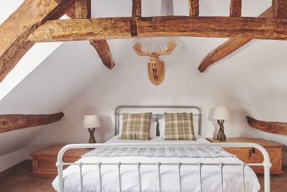 A bedroom at Crooked Cottage, Cotswolds