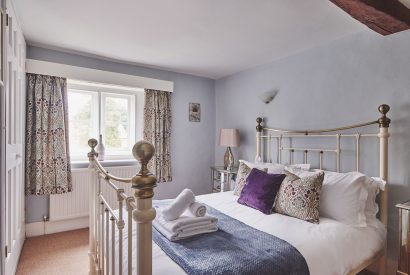 A bedroom at Church View Cottage, Cotswolds