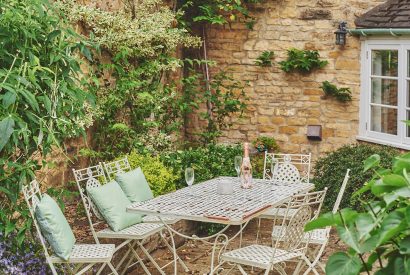 The outdoor dining table at Church View Cottage, Cotswolds