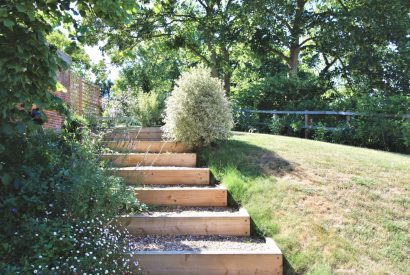 Garden steps in the garden of Gull Farm Barn, Suffolk
