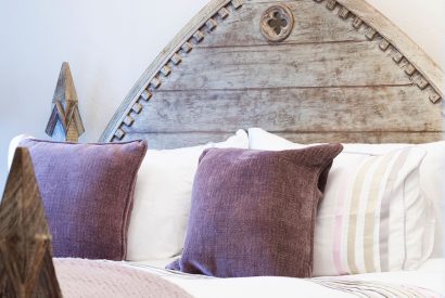 Soft furnishings in a double bedroom at Fig Tree Cottage, Cotswolds
