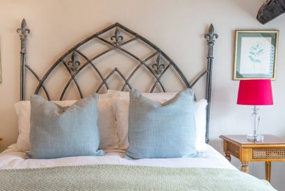 Soft furnishings on a double bed at Fig Tree Cottage, Cotswolds