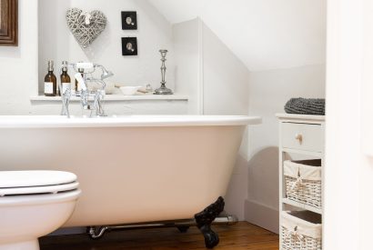 The free-standing bath in the second floor bathroom at Fig Tree Cottage, Cotswolds