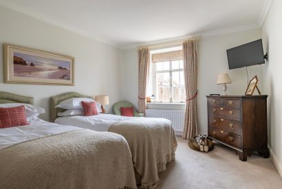 A twin bedroom at Cornish Castle, Cornwall