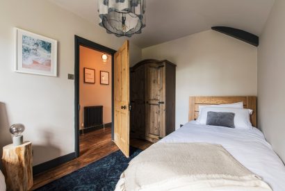 A twin bedroom at Padstone Farmhouse, Cornwall