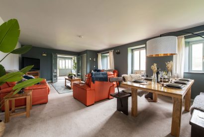 The dining and living space at Padstone Manor, Cornwall