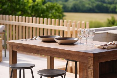 An outdoor dining area at Olive Tree Cottage, Sussex