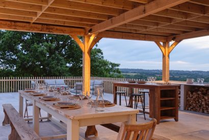 The outdoor dining table at Olive Tree Cottage, Sussex