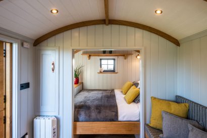 The bed at Monkwood Shepherd's Hut, Worcestershire
