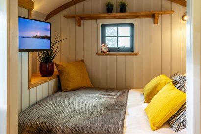 The bed at Monkwood Shepherd's Hut, Worcestershire