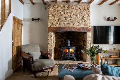 The living room with log burner at Upper Cottage, Cotswolds