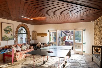 The games room with ping pong table at Kittiwake House, Devon