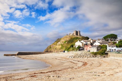 The Town And Castle Of Criccieth, North Wales, On A Bright Summer day