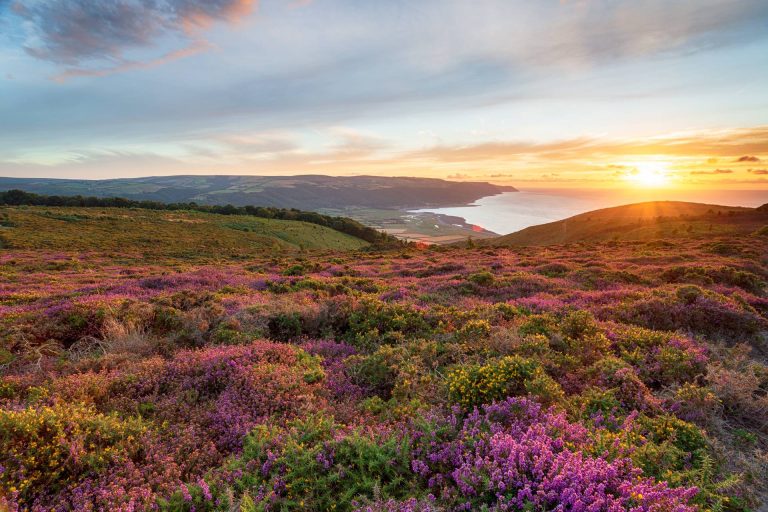 sunset over the sea and countryside in Exmoor