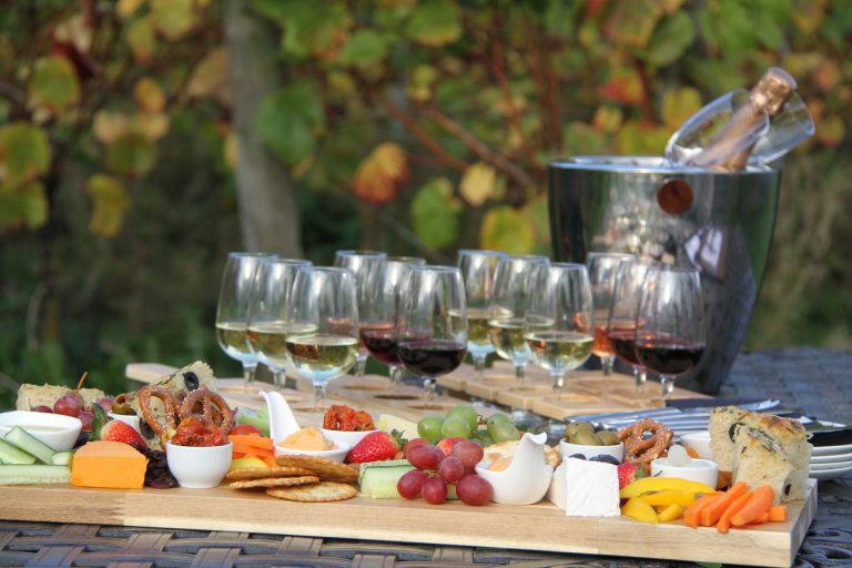 Wine and cheese platter laid out on a table outside at Kerry Vale Vineyard