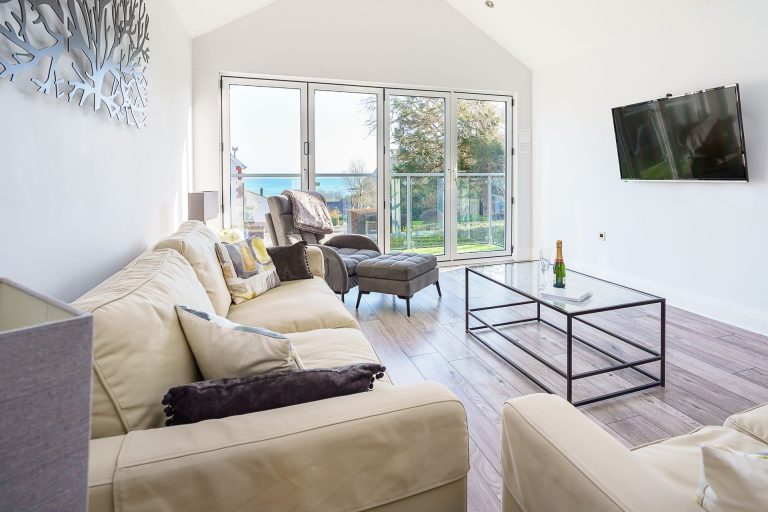 Lounge With Seating And View Towards The Sea At Ty Hir In Llanbedrog On The Llyn Peninsula