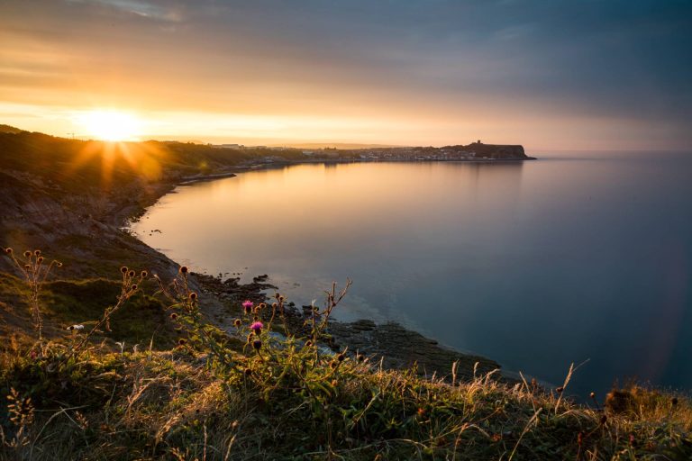 A bay in Scarborough at sunset