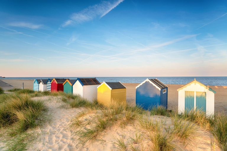 A row of beach huts overlooking the sea in Southwold