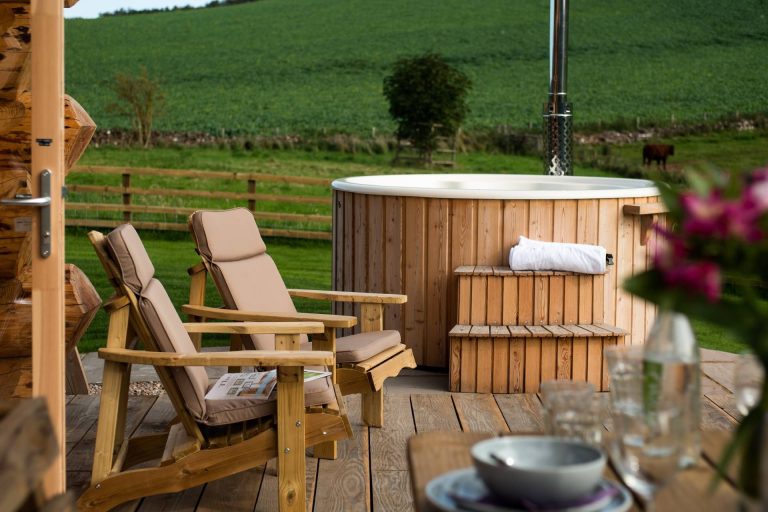 Hot tub and deck chairs overlooking the countryside