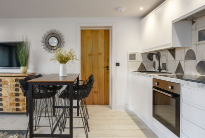 The kitchen and dining area at Seascape Apartment, Llyn Peninsula