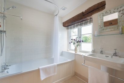 A family bathroom at Hempston Cottage, Devon