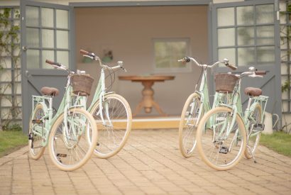 Four bikes outside of the cottage at Brickworks and Vines, Isle of Wight