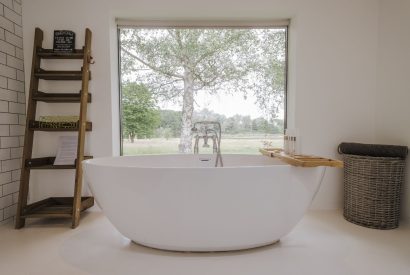 A large family bathroom with free standing bath at Brickworks and Vines, Isle of Wight