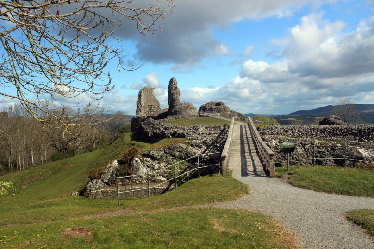 Ruins of Montgomery Castle on top of a hill in Powys, Wales