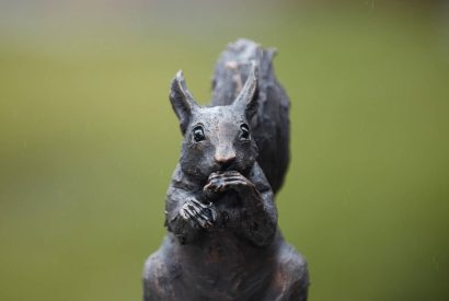 A squirrel statue at Beatrix Cottage, Lake District