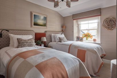 A twin bedroom at Beatrix Cottage, Lake District